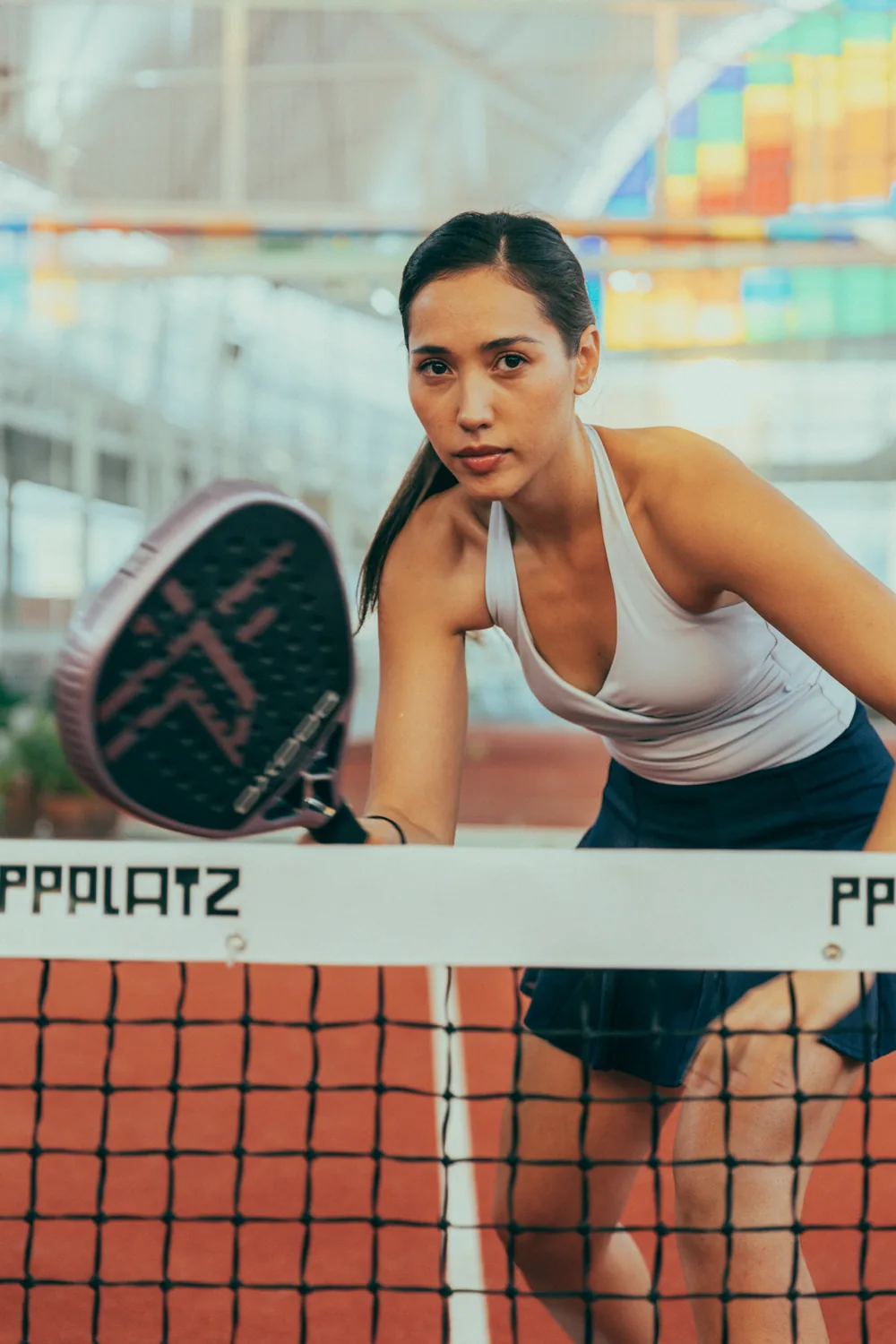 A player watching the ball over the net at PPPLATZ